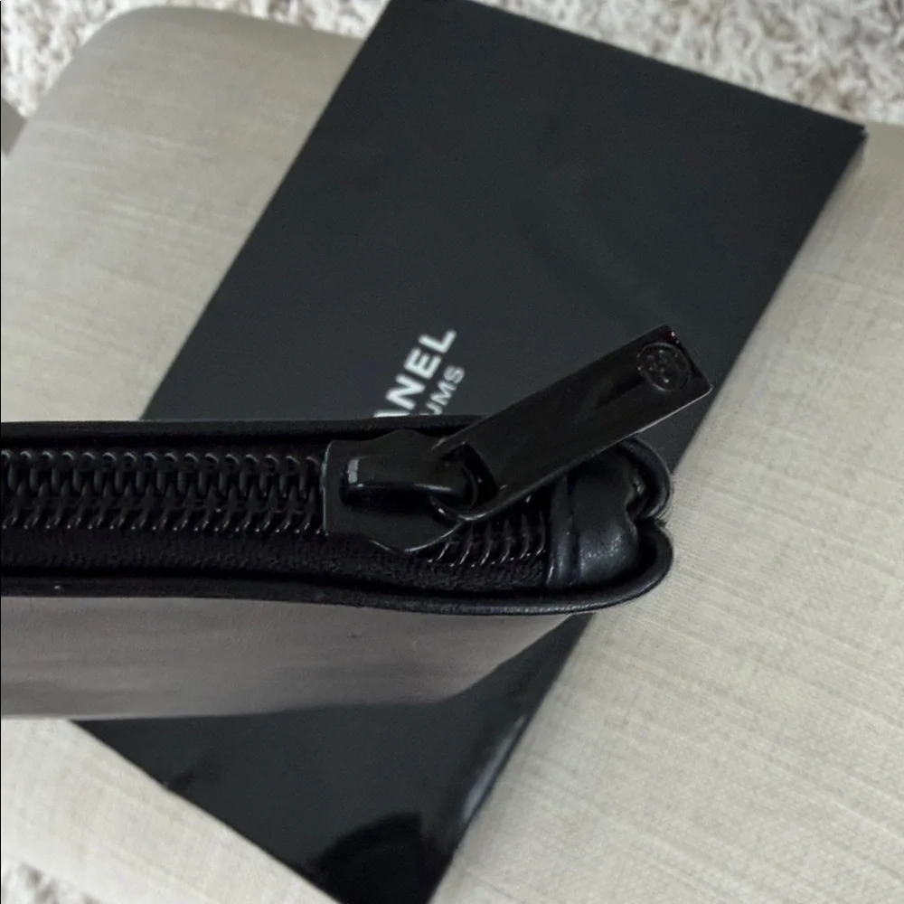 CHANEL Embossed Leather Toiletry Pouch